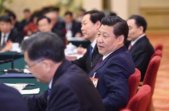 2014年3月9日，中共中央总书记、国家主席、中央军委主席习近平参加十二届全国人大二次会议安徽代表团的审议。